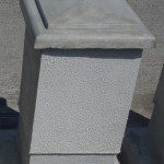 Moulded saddle back pier capping